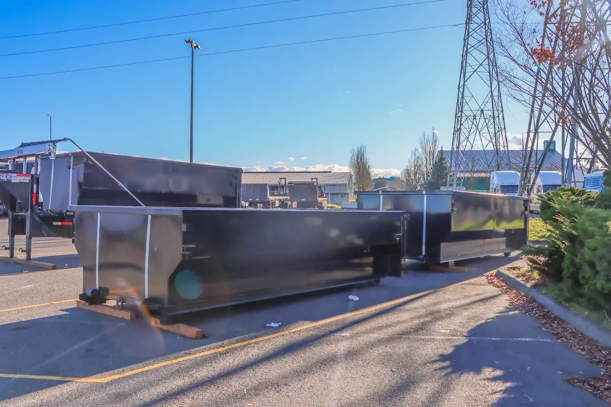 Roll-off dumpster ready for waste disposal at job site for Roofing Dumpster Rental in Fort Shawnee